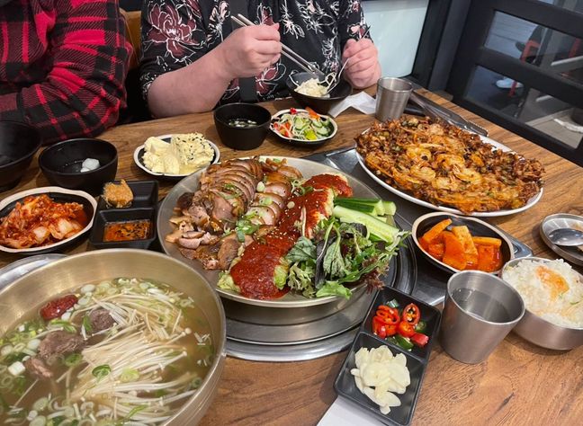 Photo of a table full of Korean food